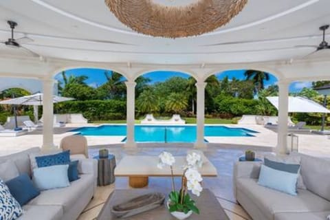 50ft private swimming pool with sun umbrellas, loungers and access to the private garden.