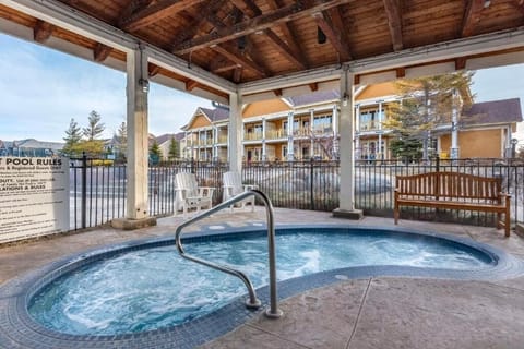 Unwind in bubbling warmth under a sheltered, cozy cabana.