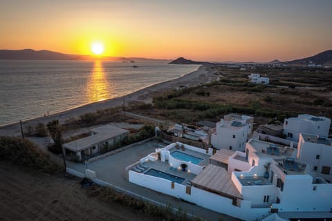 Sunset from the patio or upstairs balcony anyone. Just steps from the beach