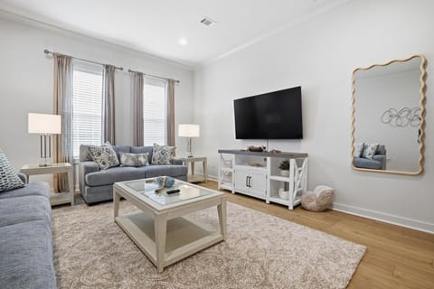 Cozy coastal living area perfect for movie nights