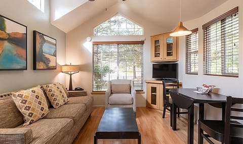 Lounge together in a bright living area with relaxing views.