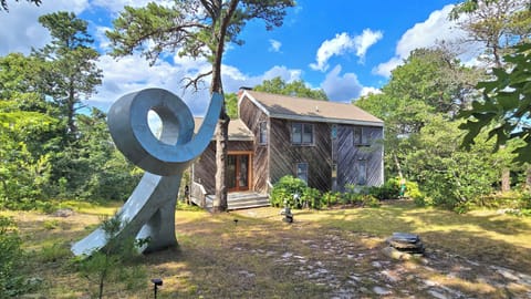 Walk or bike to town from this four-bedroom Wellfleet hideaway