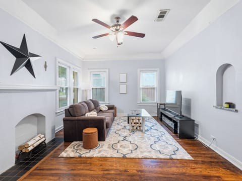 Bright living room with comfy seating and plenty of space to relax.