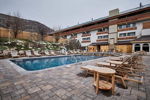 Unwind with plenty of loungers and wide-open pool views.