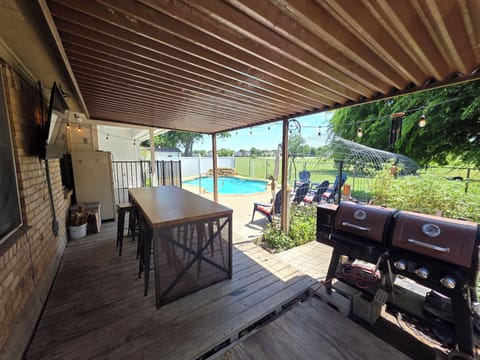 pool visible, fence, summer fun , patio, grill, outdoor, dining 