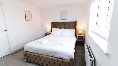 A calm and comfortable bedroom designed for quality sleep after long shifts, with soft linens and a peaceful atmosphere throughout the night.