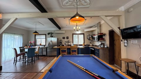 Lower unit suite, equipped with Studio Kitchen and Pool table.