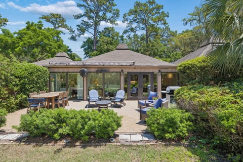 Back porch views with space to enjoy a meal, watch some golf, cook with the gas grill, or just to simply unwind and relax.