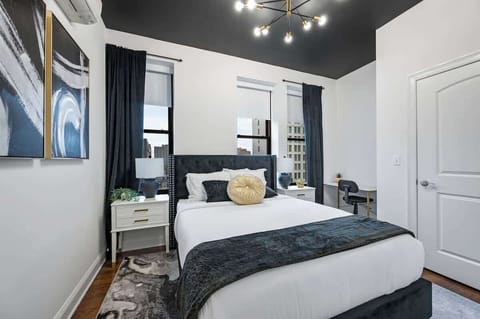 Beautifully decorated bedroom with room-darkening shades and curtains for a serene, restful environment. Enjoy a peaceful night’s sleep on our Nova Memory Foam Queen mattress, designed for ultimate comfort and support. Perfect for a rejuvenating stay