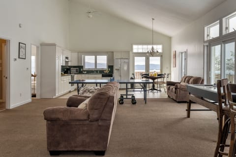 Open-concept floor plan with various games for endless fun.