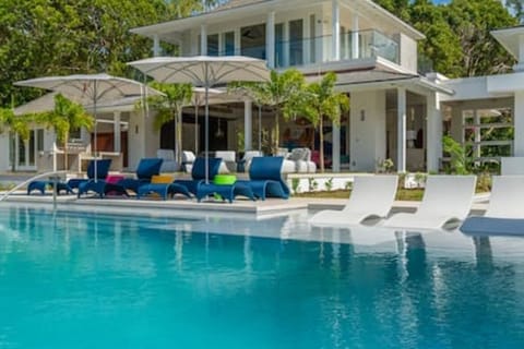 Beautiful salt water swimming pool with in pool seating and plenty of sun loungers.