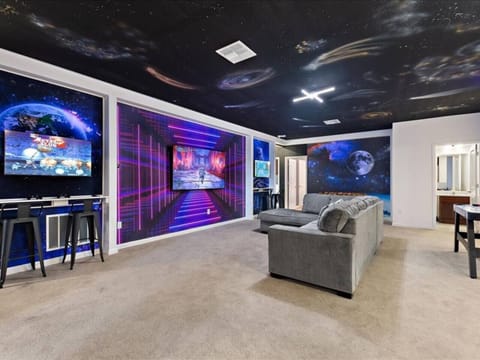 Upstairs Loft with games and 75" TV.