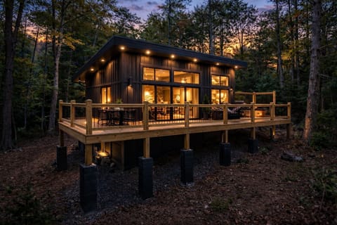 Both cabins offer a quiet, wooded setting.