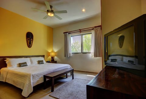 Master bedroom with king-size bed and full bathroom. Cable TV and closet.