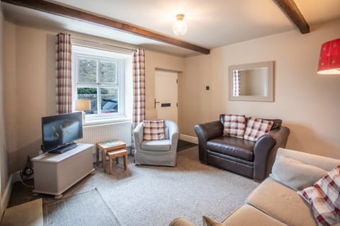 Gather together after countryside adventures in this cosy living space, perfect for film nights, local takeaways and unwinding beside the warmth of the fire.