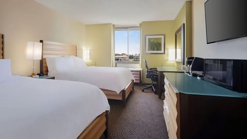 Settle in with a dedicated desk and easy in-room entertainment.