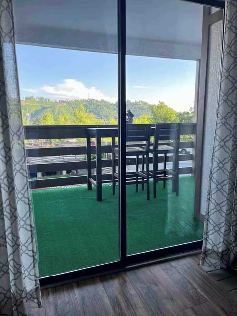 Private covered balcony that is great for sipping your morning coffee!