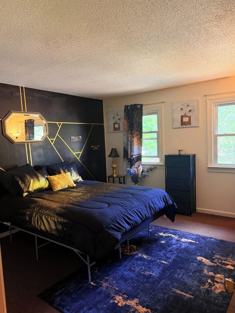 A stylish black and gold luxury retreat designed with elegance, comfort, & ease.