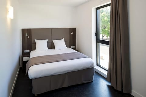 Bedroom. Interior and views may vary based on location and availability.