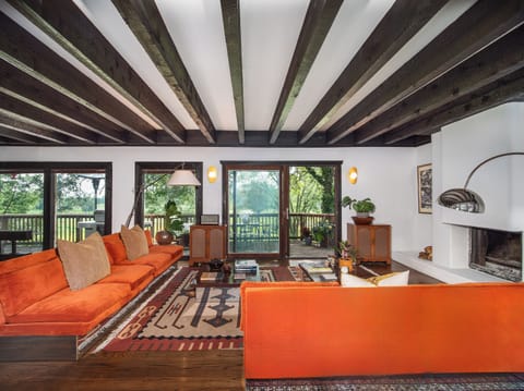 Large 40' x 15' Open Living Room /Kitchen Area with golf course and atrium views