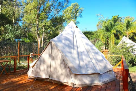 cosy private tent on wooden platform