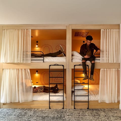 Tuck into playful bunks that feel private and snug.