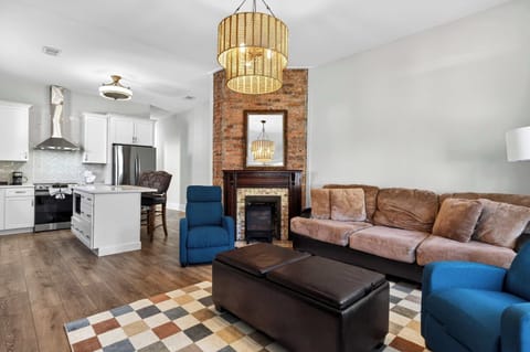 Living Room: Sink into the sectional and let the original-brick fireplace do the rest.