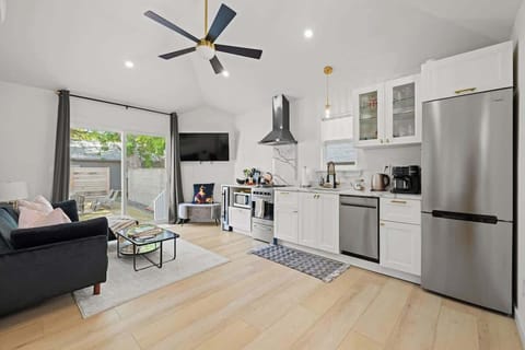 Complete with a full kitchen - Fridge - Stove - Dishwasher - Microwave and even a wine fridge!