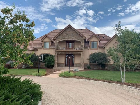 Main Residence on 6 acres, front door keypad, attached garage access just to the left.