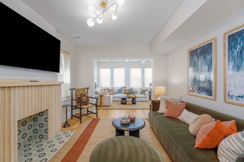 I love the unique style in this living area. We paired the main couch with these cool gothic accent chairs and a matching ottoman.