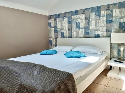 Bedroom. Interior and views may vary based on location and availability.