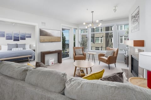 Bright, open-concept living room with a cozy sectional.