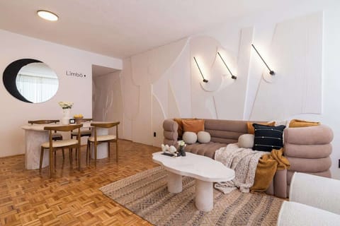 Relax in our cozy, modern, and well illuminated living room. Enjoy your favorite shows on the TV with standard cable and Netflix. The perfect space to kick back and enjoy some downtime!