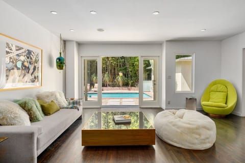 Casual family room with glass doors leading to outdoor area