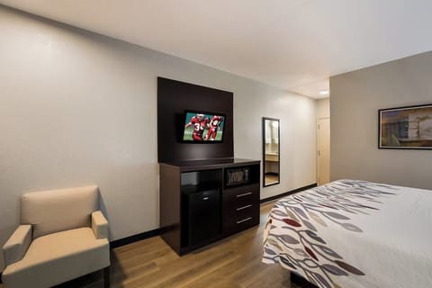Kick back with in-room entertainment and plenty of storage.