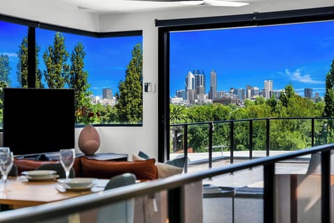 Wake up to sweeping skyline views right from your living space.