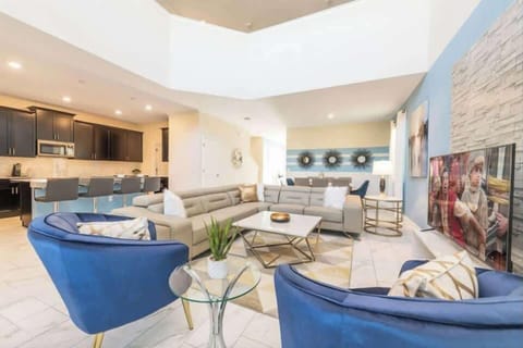 Living Room: Experience vibrant decor and spacious design perfect for family gatherings and fun!