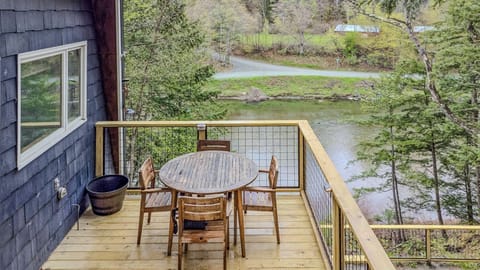 Balcony dining table with river in the background