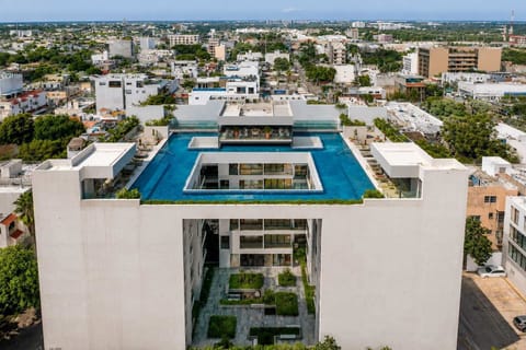 Aerial view of the Ceiba 25 building and its shared rooftop pool (communal)
