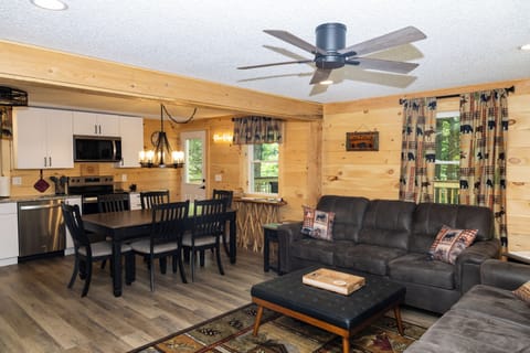 Wrapped in warm pine wood, the living room offers a cabin style retreat