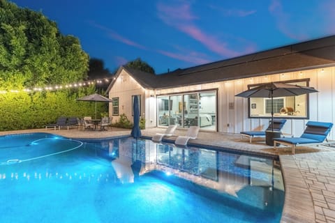 Poolside seating invites you to enjoy morning coffee or sunset cocktails