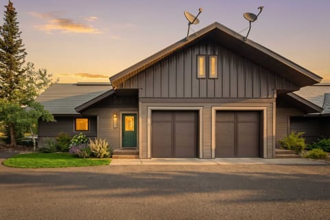 Exterior: On-site parking for 2 vehicles (1 in garage, 1 in shared lot) 