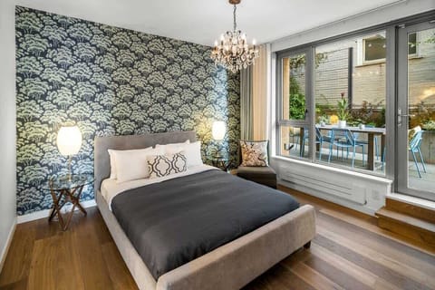 Master bedroom with ensuite bathroom, walk in closet and terrace access. King bed with master bathroom and walk in closet.
