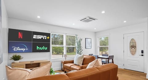 Kick back on the leather sectional and stream your favorites on the Smart TV with Netflix, Hulu, Disney+, and ESPN+.