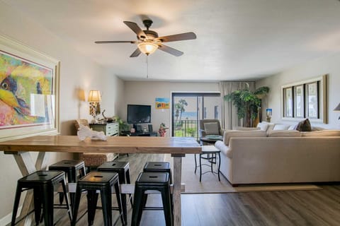 Spacious living and dining area with cozy natural light