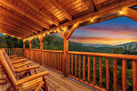 Large porch with rocking chairs, and views for miles