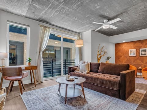 Living Room Oasis: Bright space with modern decor, ideal for relaxing or planning your adventures!