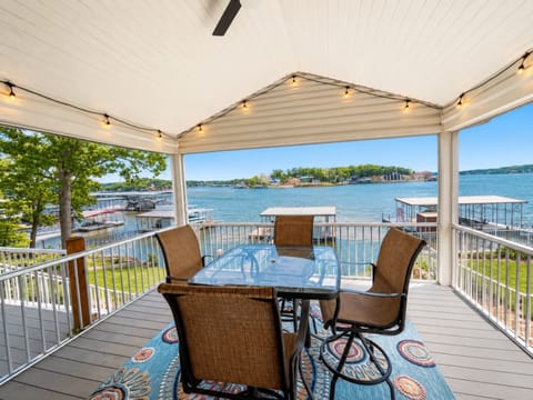 Lounge the day away or dine alfresco with lake views on the screened deck​