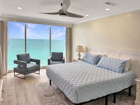 Primary bedroom; 8 ft floor to ceiling windows!