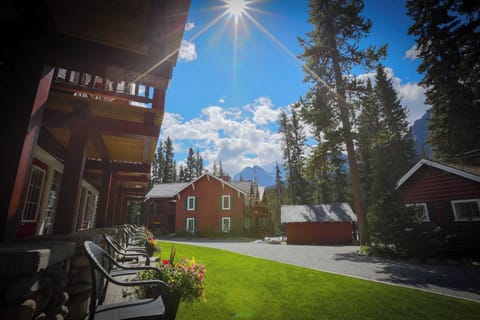 Towering pines, blue skies, and the warmth of a classic mountain lodge make for an unforgettable escape.